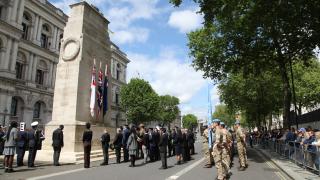 memorial ceremony at cenotaph in london with un peacekeepers and diplomats in attendance 