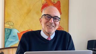 Sir Charles Petrie gives his acceptance speech via video