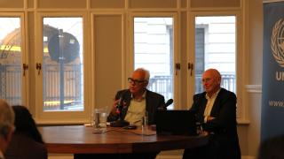 Mark Malloch-Brown and UNA-UK Chair Ian Martin address the room of attendees at UNA-UK first speaker series event
