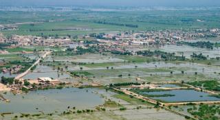 An aerial view of the devastated landscape shot during Secretary-General António Guterres